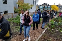 Students visiting local pea patch